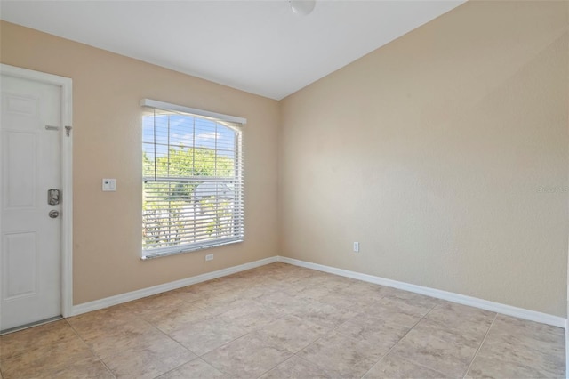 view of tiled spare room