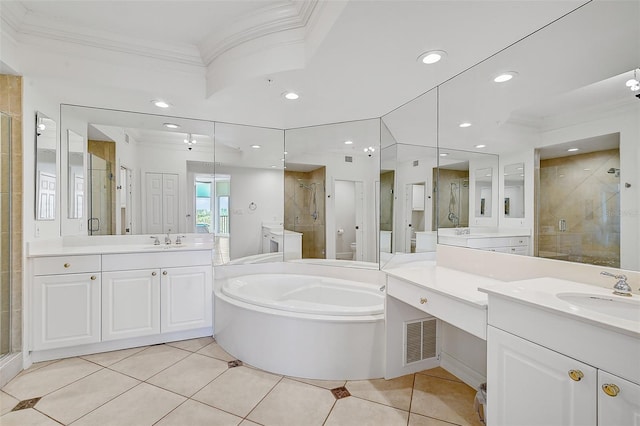 bathroom featuring vanity, tile floors, and plus walk in shower