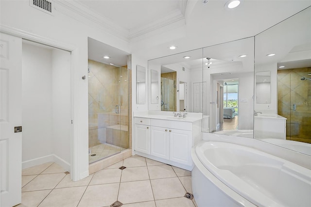 bathroom featuring tile floors, vanity, and plus walk in shower