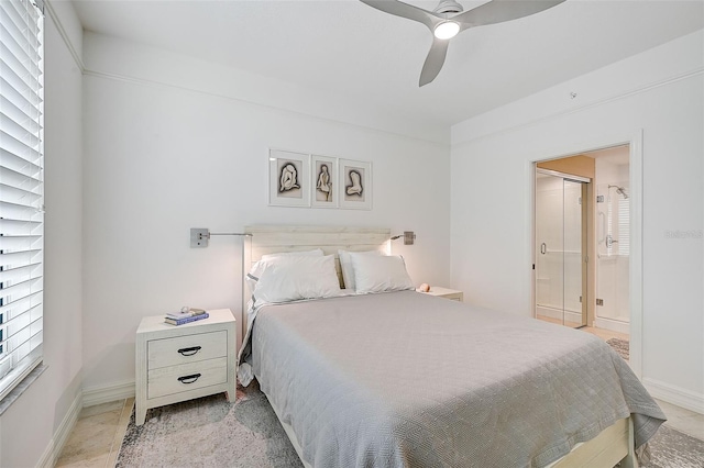 bedroom featuring ceiling fan and ensuite bathroom