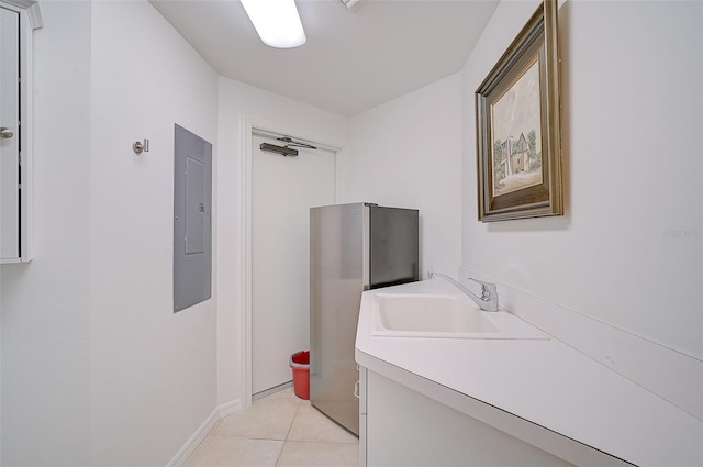 bathroom featuring vanity and tile flooring