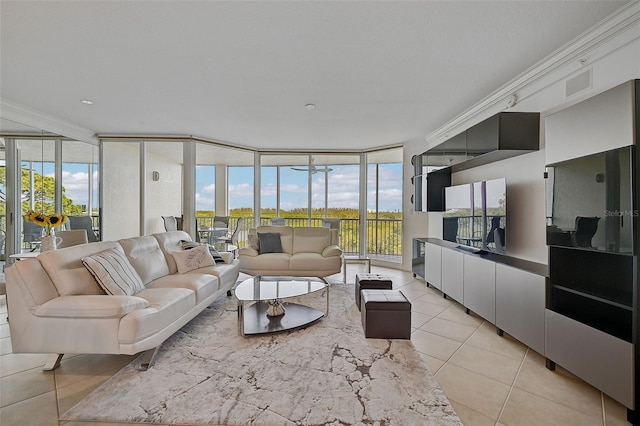 living room featuring ornamental molding, floor to ceiling windows, and light tile floors