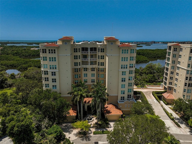 view of property with a water view