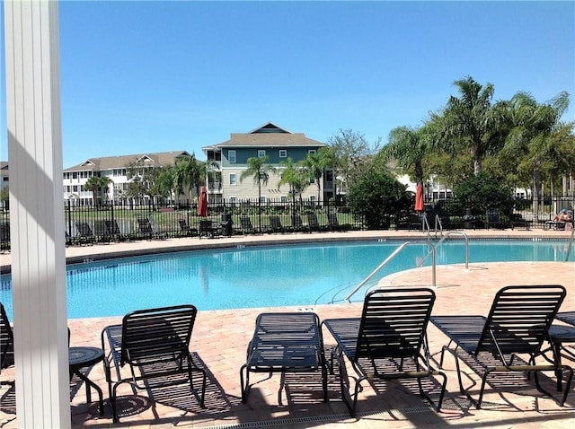 view of pool featuring a patio