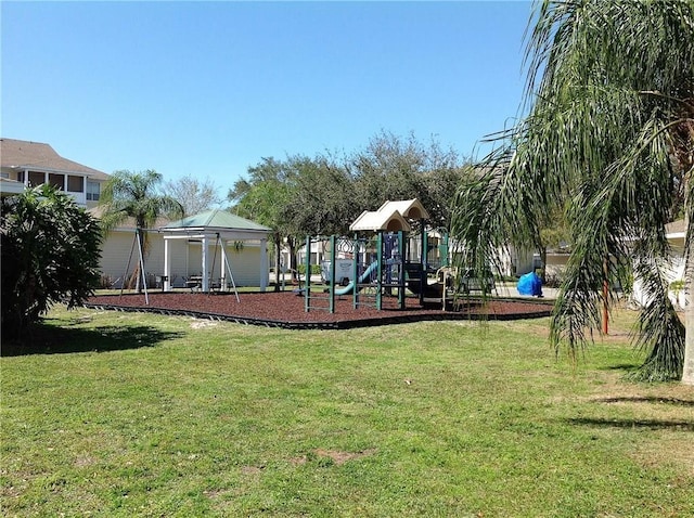 view of playground featuring a lawn