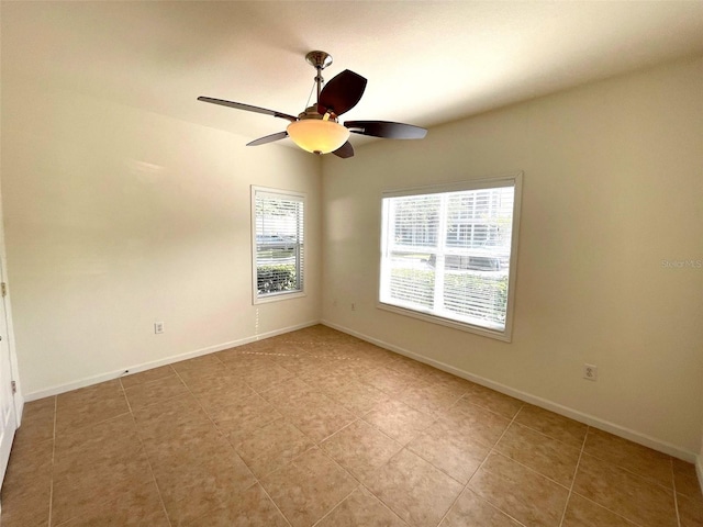 empty room featuring ceiling fan