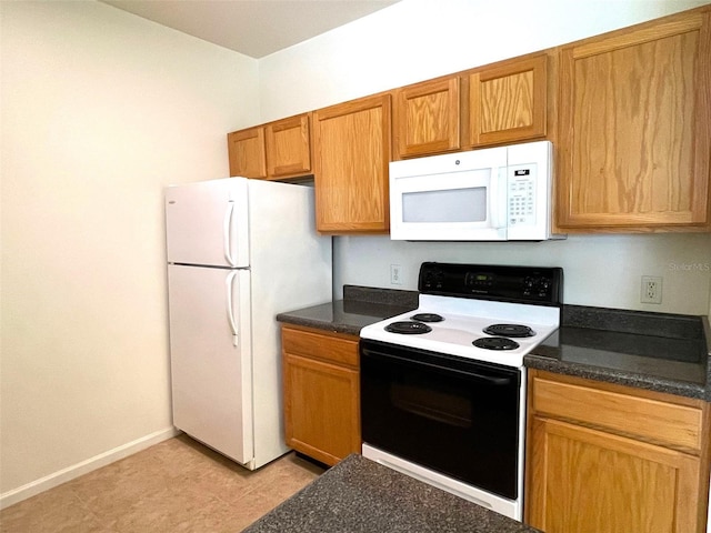 kitchen featuring white appliances