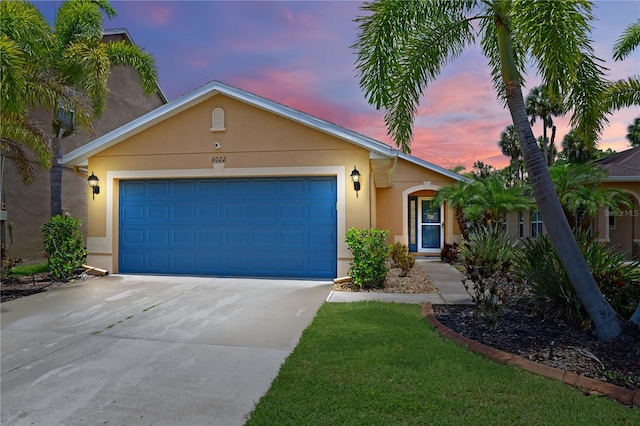 single story home featuring a garage