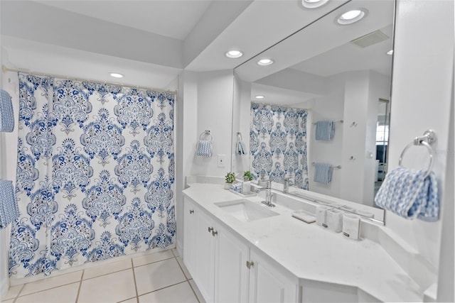 bathroom with vanity and tile patterned floors