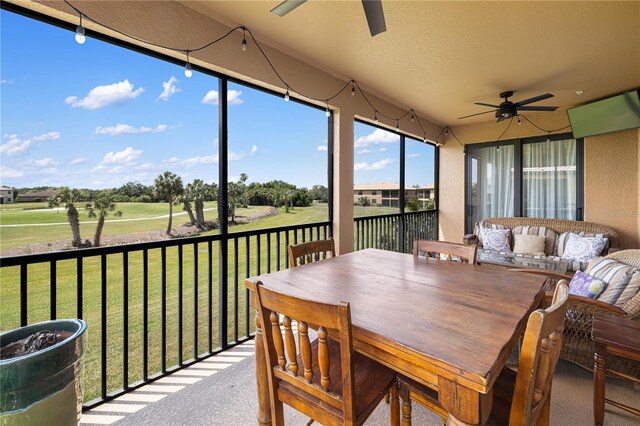 sunroom / solarium with ceiling fan