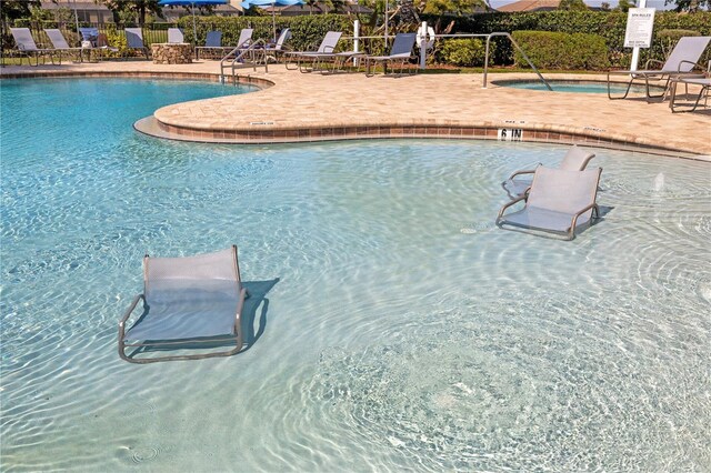 view of pool with a patio area