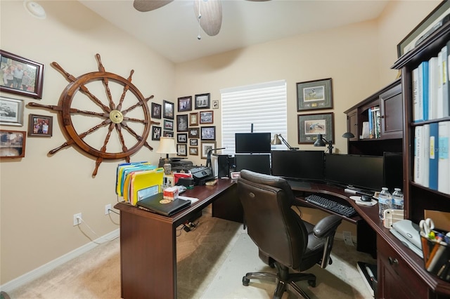 office area featuring ceiling fan and light colored carpet