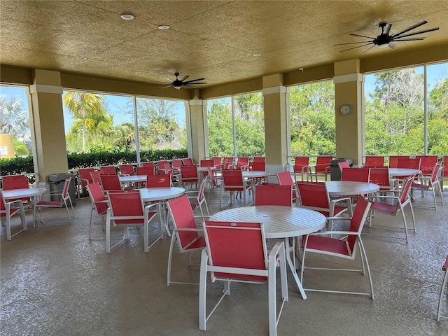 view of patio featuring ceiling fan