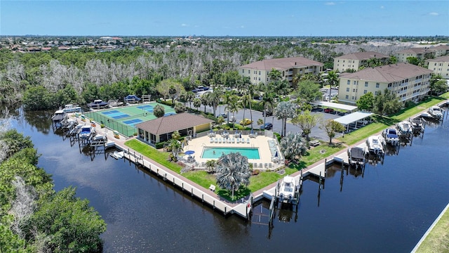 birds eye view of property featuring a water view