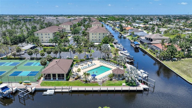 birds eye view of property with a water view