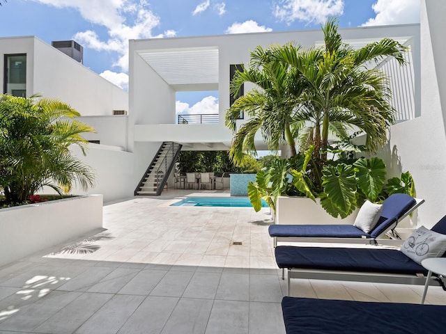 view of swimming pool featuring a patio