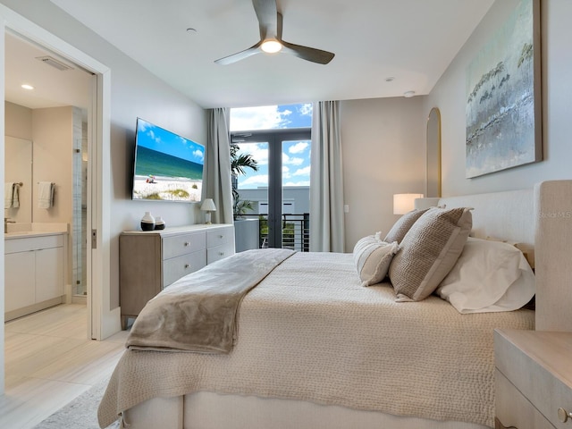 bedroom with floor to ceiling windows, ceiling fan, french doors, ensuite bath, and access to outside