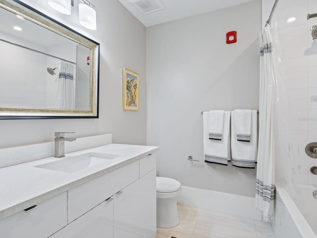 full bathroom with vanity, shower / bath combination with curtain, and toilet