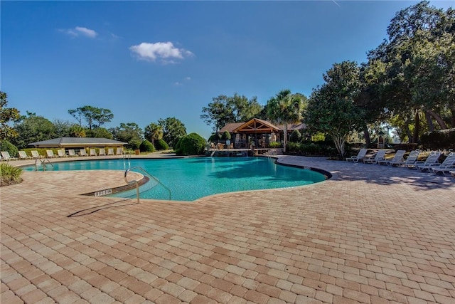 view of pool featuring a gazebo and a patio area