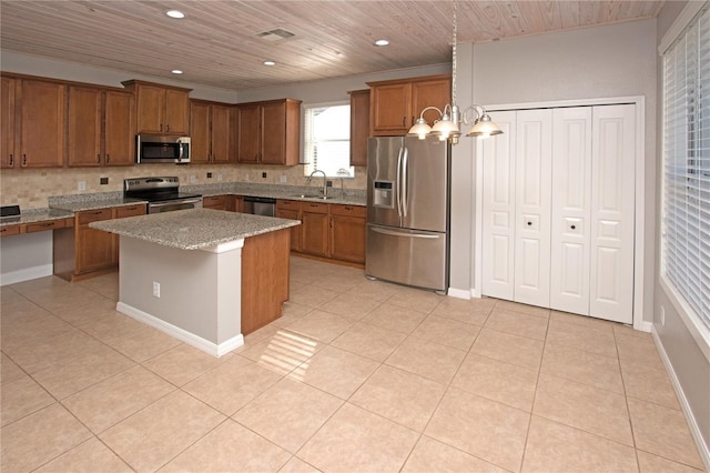 kitchen featuring a kitchen island, sink, light tile patterned floors, wood ceiling, and stainless steel appliances