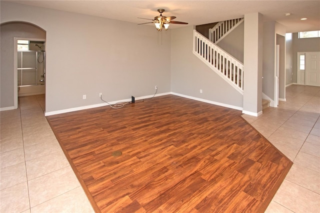 unfurnished room featuring ceiling fan and light hardwood / wood-style flooring