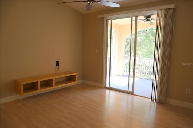 unfurnished room featuring ceiling fan and light hardwood / wood-style flooring