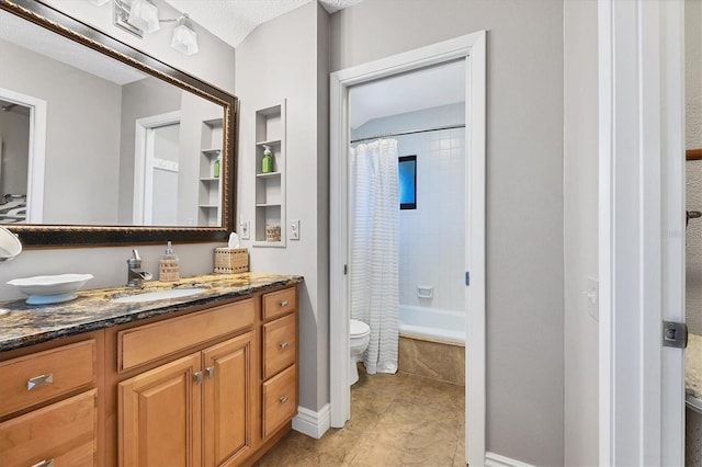 full bathroom featuring shower / bath combination with curtain, vanity, and toilet