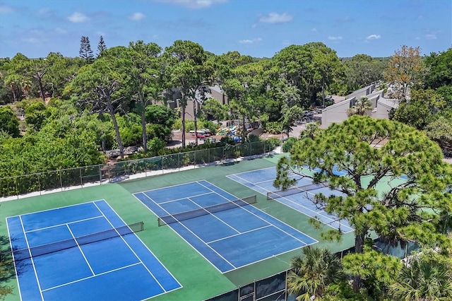 view of tennis court featuring basketball court