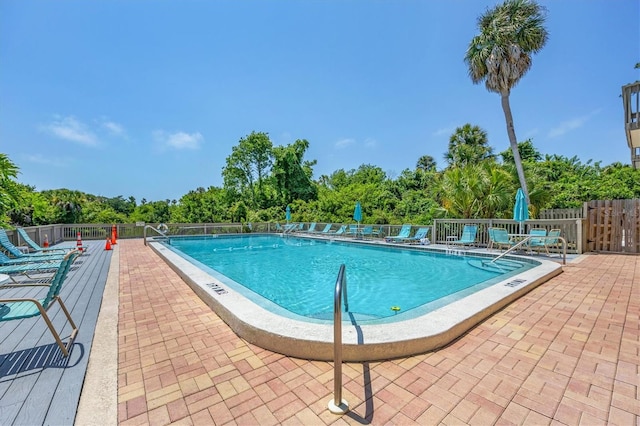 view of swimming pool featuring a patio