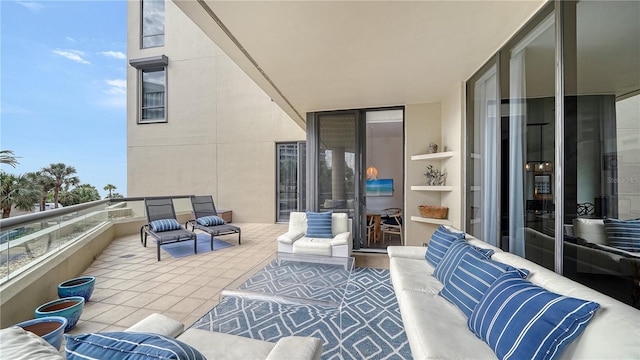 view of patio / terrace with a balcony