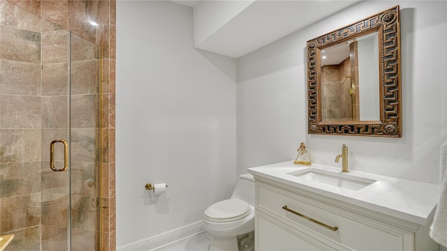 bathroom with toilet, walk in shower, and vanity