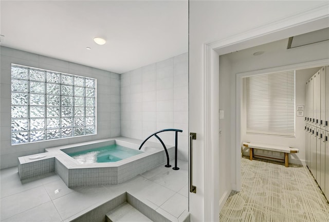 bathroom with tile patterned floors