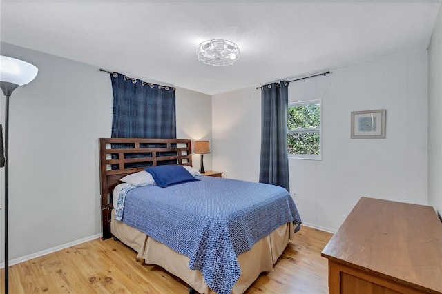 bedroom with light hardwood / wood-style floors