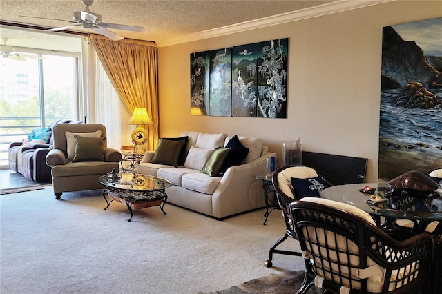 carpeted living room with a textured ceiling, ceiling fan, and ornamental molding