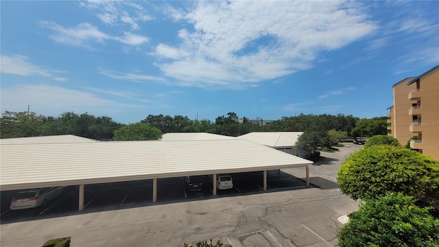 exterior space with a carport