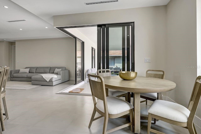 dining area featuring tile flooring