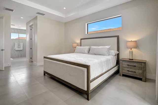 tiled bedroom featuring multiple windows