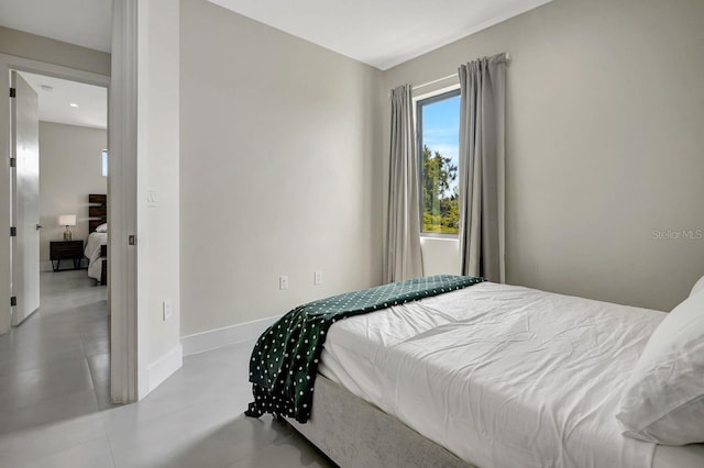 bedroom featuring tile floors