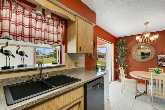 kitchen with decorative light fixtures, a textured ceiling, black dishwasher, backsplash, and sink