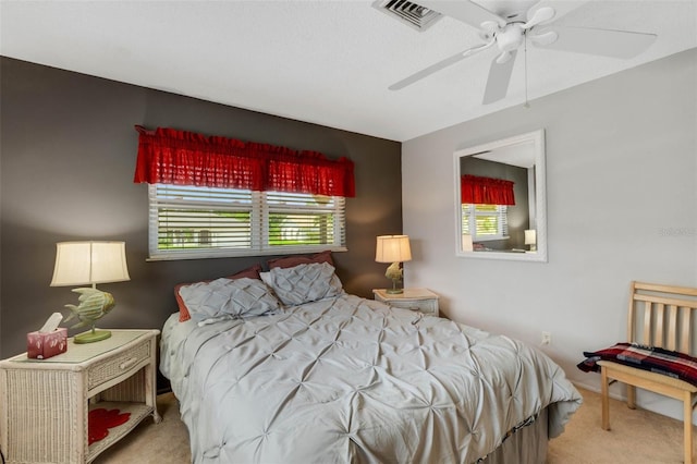 bedroom featuring ceiling fan and carpet floors