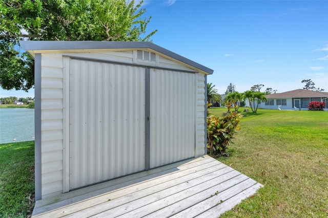 view of shed / structure with a lawn