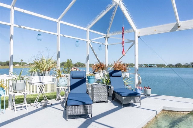 sunroom with a water view