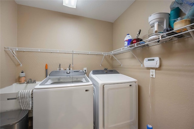 laundry room featuring washer and dryer