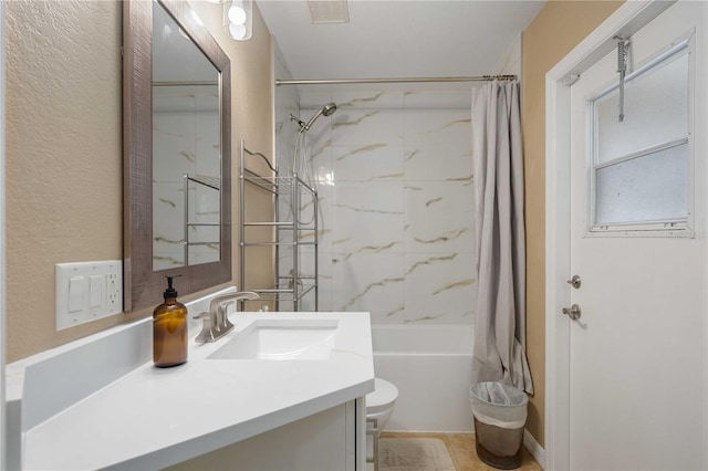 full bathroom featuring shower / bathtub combination with curtain, toilet, and large vanity