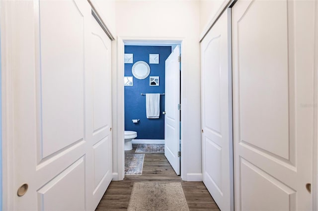 hall featuring dark hardwood / wood-style floors