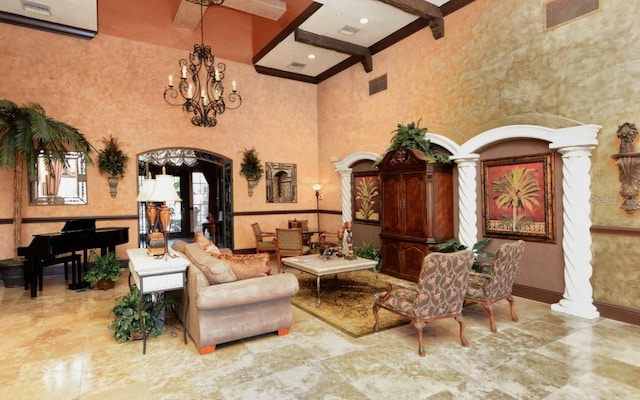 interior space with beam ceiling, a high ceiling, tile flooring, and ornate columns