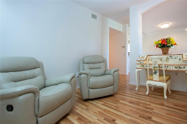 sitting room with light wood-type flooring