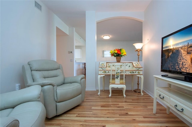 living area featuring light hardwood / wood-style floors