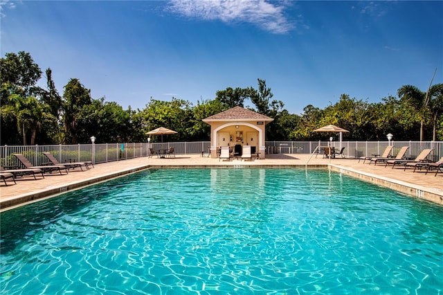 view of pool featuring a patio area