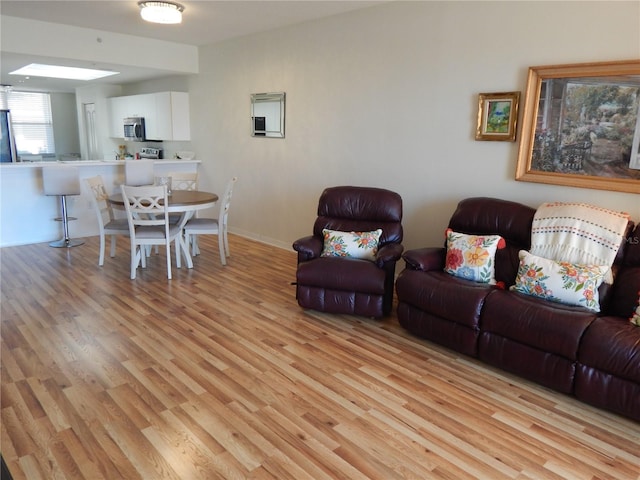 living room featuring light wood-type flooring